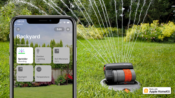 A smartphone displaying the Apple HomeKit app with GARDENA products in use